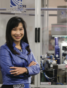 Peng in front of Transformix’s latest innovation, the CNC AssemblyTM fabricator.